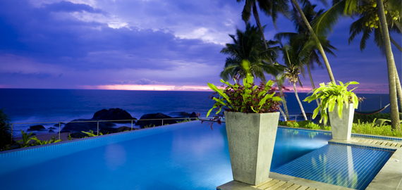 Slideshow Image of a beafiful house over looking a pool